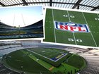 The hallowed turf of the MCG has been transformed into an American football field ahead of the historic NFL clash between the Los Angeles Rams and the San Francisco 49ers.