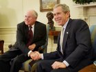 President George Bush Junior, right, greets Australian prime minister John Howard during their meeting in the Oval Office at the White House, Feb. 10, 2003 in Washington