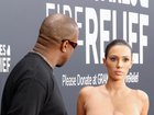 Bianca Censori has continued her trend of barely-there outfits, posing in a gold 80s-style photo shoot reminiscent of Kim Kardashian’s campaigns.