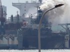 Firefighters have extinguished a blaze on a vessel in a Chinese shipyard, with 25 people killed. 