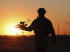A Ukrainian soldier with a military drone.