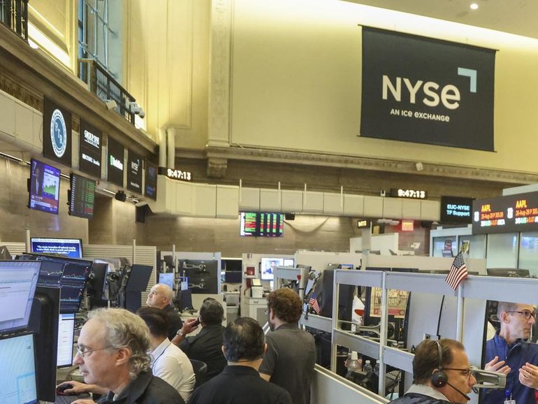 Retreating oil prices and strong consumer price data led Wall Street to finish Friday higher.