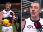 Taylor Walker leaves with the match ball after his final AFL game.