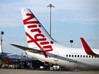 Mid-air horror as men restrained on Virgin flight from Melbourne.