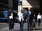 Alan Jones (C) arrives at the Downing Centre in Sydney.
Christian Gilles / NewsWire
