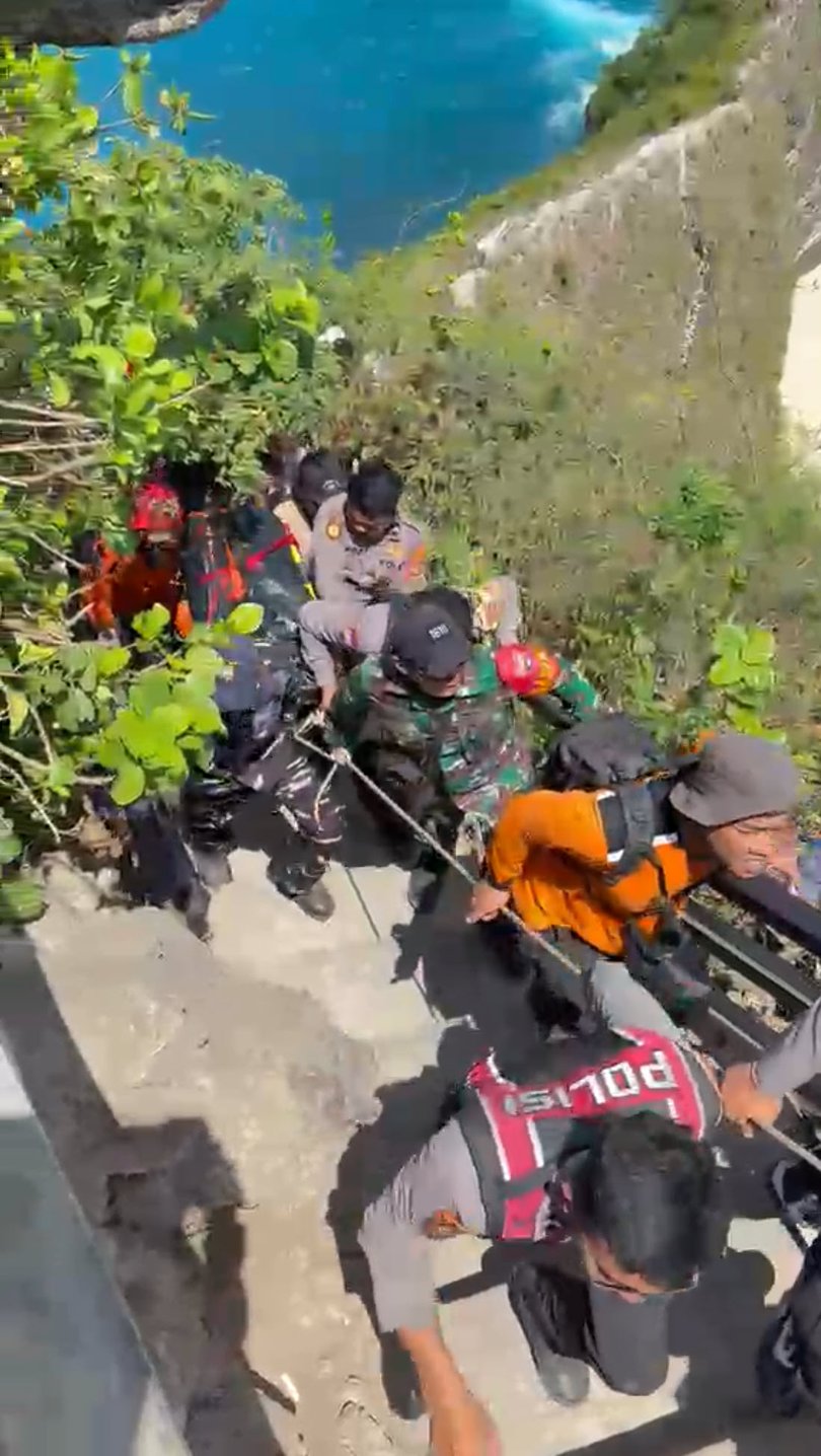 The treacherous evacuation up the cliffside of Kelingking Beach in Bali Picture: Unknown