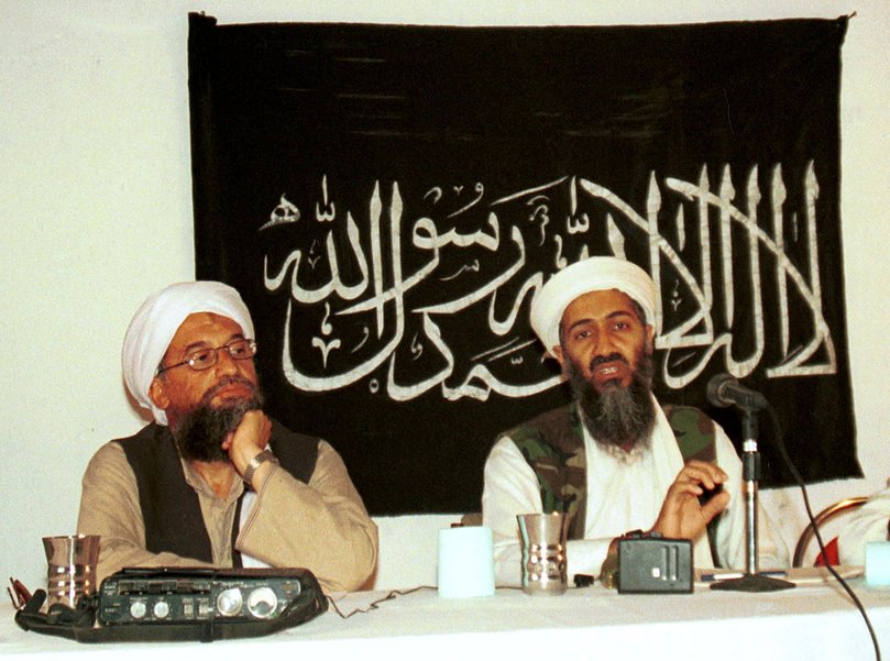 Ayman al-Zawahri, left, listens during a news conference with Osama bin Laden in Khost, Afghanistan, in 2004.