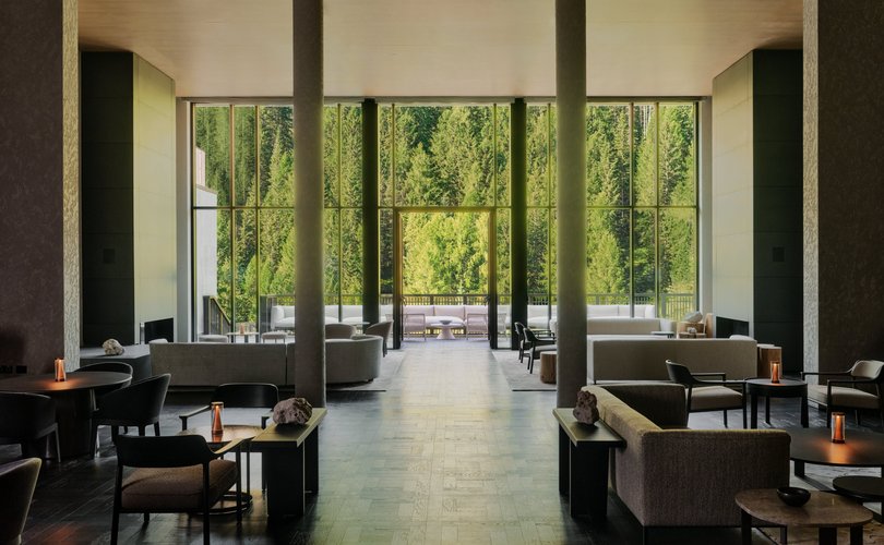 Full-length windows reveal massive tapestries of the Dolomites.