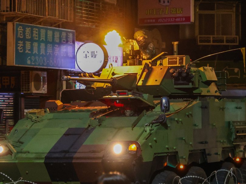 An invasion drill is conducted in Taipei in August.