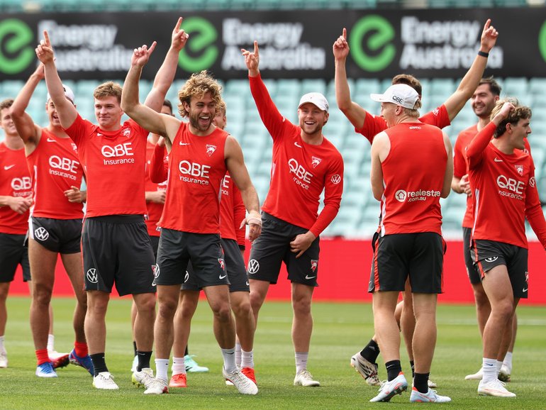 James Rowbottom and Swans players at training on Thursday.