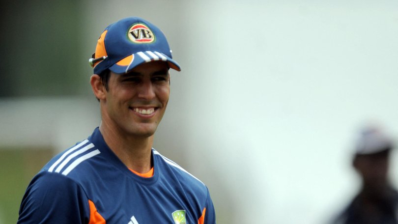 Australian cricketer Mitchell Johnson poses with a tennis racket during a practice session at the Pallekele International Cricket Stadium in Pallekele on September 6, 2011. Michael Clarke will look to put his first Test series as Australia's captain beyond Sri Lanka's reach when the second match opens in Pallekele on September 8, 2011. The tourists won the first Test on a controversial dusty wicket in Galle by 125 runs last week to take the lead in the three-match series, Australia's first in Sri Lanka since 2004. AFP PHOTO/Ishara S. KODIKARA (Photo by Ishara S.KODIKARA / AFP) ISHARA S.KODIKARA