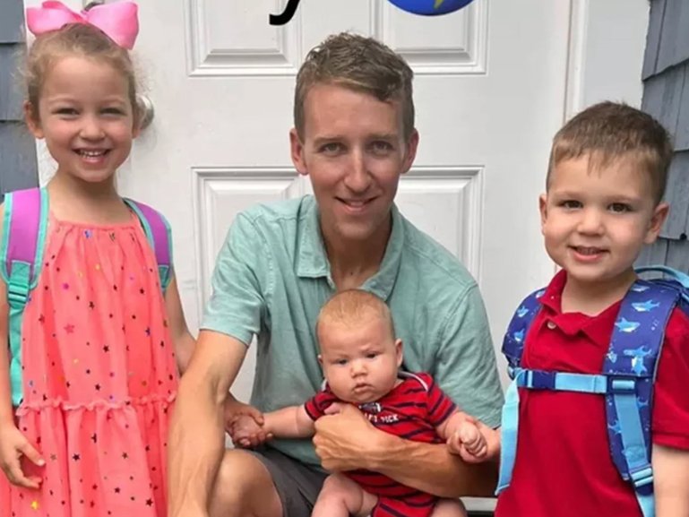 Patrick Clancy with children Cora, Callan and Dawson.