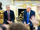 President Donald Trump meets with Prime Minister Mark Carney of Canada at the White House in Washington on October 7, 2025. 