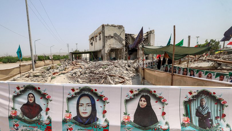 The building of the destroyed Shajareh Tayyebeh primary school is pictured surrounded by rubble in Minab in Iran’s Hormozgan province.