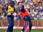 England's Sonny Baker celebrates the wicket of Sri Lanka's Lahiru Udara in their T20 triumph. (AP PHOTO)