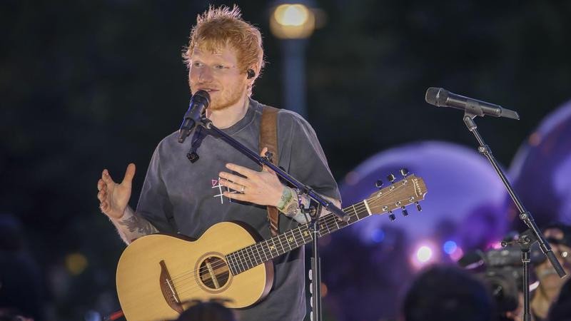 An emotional Ed Sheeran told fans he's "so grateful that you're here tonight with me". (AP PHOTO)