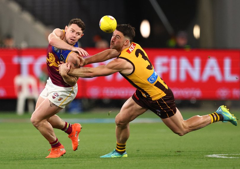 Lachie Neale battling Jai Newcombe on Saturday.