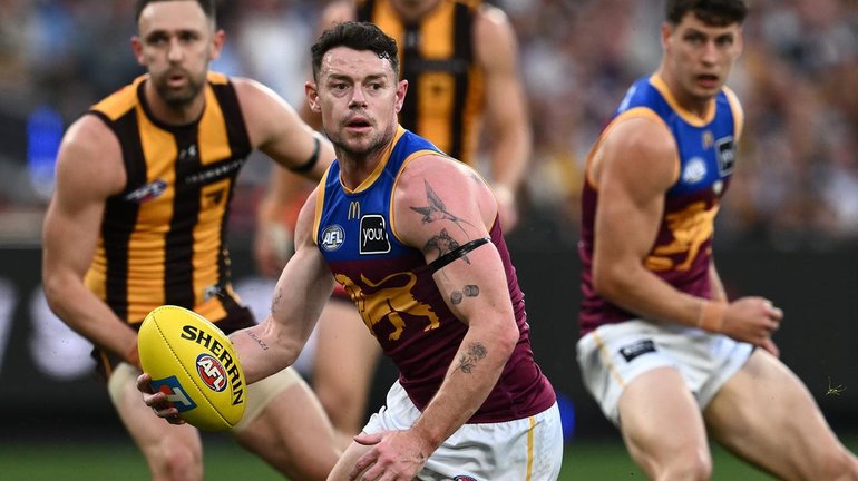 Brisbane’s Lachie Neale was cleaned up at the first centre bounce, but stayed on the field. 