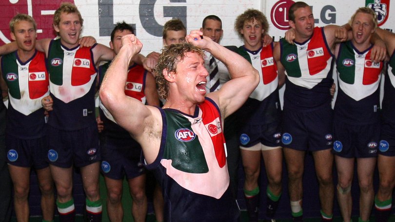 Shaun McManus celebrates after his final AFL game in 2008.