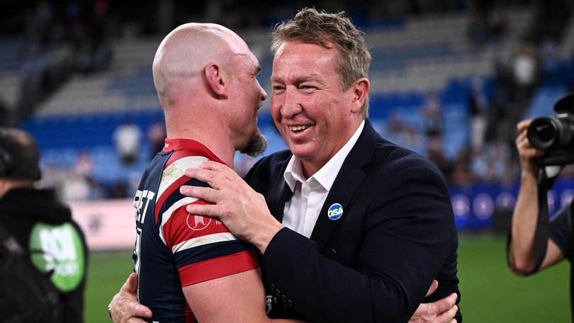 Angus Crichton of the Roosters is embraced by head coach Trent Robinson following their win in the NRL Semi Final between the Sydney Roosters and the Cronulla-Sutherland Sharks at Allianz Stadium in Sydney, Saturday, September 19, 2026. (AAP Image/Dan Himbrechts) NO ARCHIVING, EDITORIAL USE ONLY DAN HIMBRECHTS