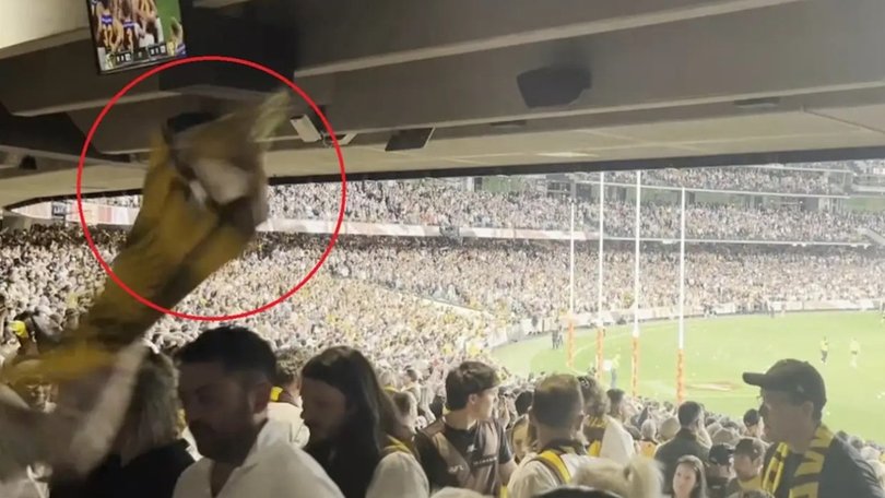 Nachos are thrown at AFL fans.