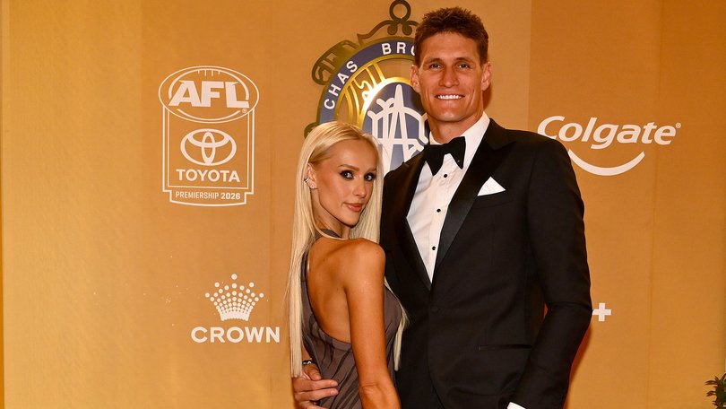 VARIOUS CITIES, AUSTRALIA - SEPTEMBER 21: Rory Lobb of the Western Bulldogs and fiancé Lexi Mary arrive ahead of the 2026 Brownlow Medal at Crown Palladium on September 21, 2026 in Melbourne, Australia. (Photo by Quinn Rooney/Getty Images)
