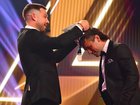 Nick Watson accepts his AFL award for Mark of the Year.
