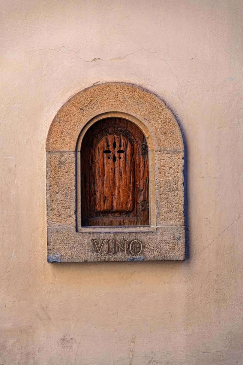 The ancient "buchetta del vino" or “little wine window” in Florence’s historic centre.