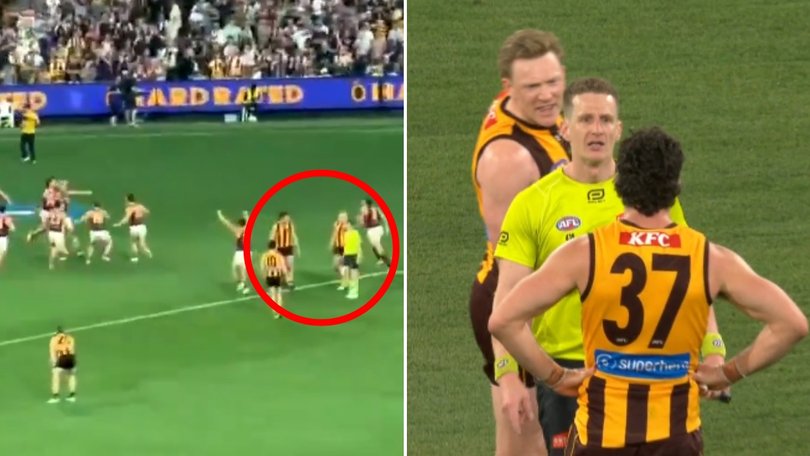 James Sicily and Tom Barrass going at Hayden Meyer.