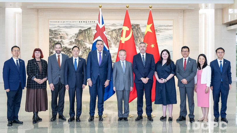 The Australian delegation poses before the in Beijing. IDCPC