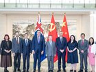 The Australian delegation poses before the  in Beijing. IDCPC