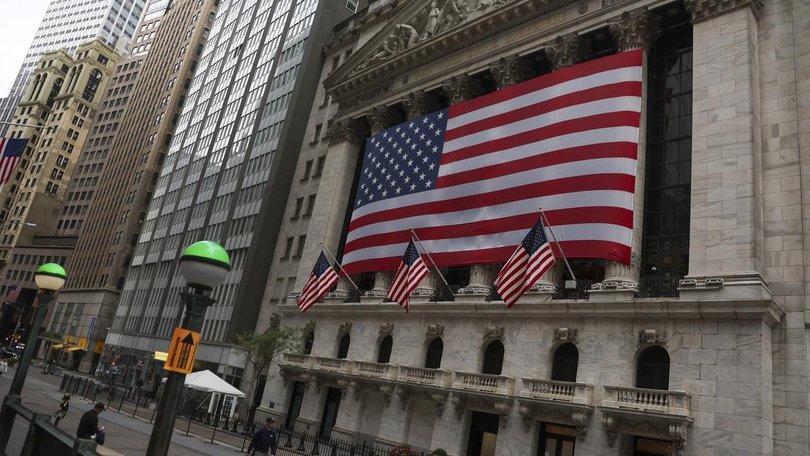 Wall St closed higher with tech stocks regaining to push the Nasdaq to a record high. (EPA PHOTO)