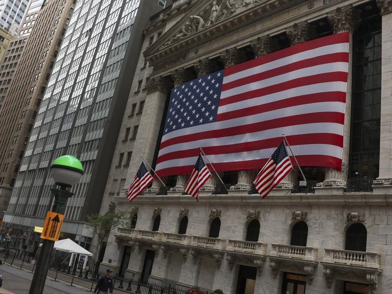 Wall St closed higher with tech stocks regaining to push the Nasdaq to a record high. (EPA PHOTO)