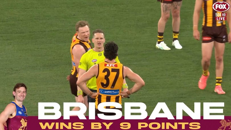 James Sicily and Tom Barrass approach umpire Hayden Meyer post-game.
