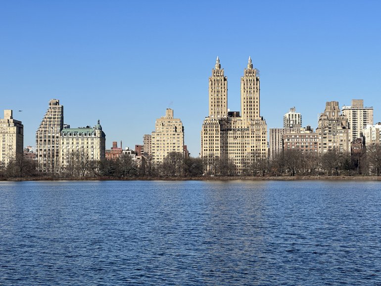 New York seen across the reservoir in Central Park, New York.