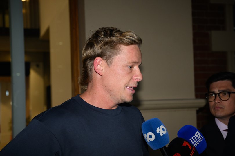 Swans player Isaac Heeney makes a statement to media as he leaves Sydney Swans HQ in Sydney.