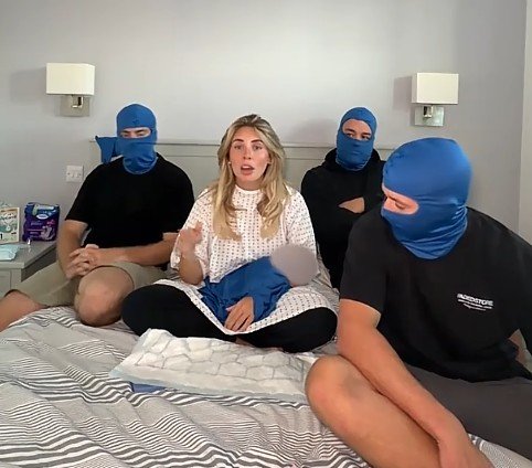 Bonnie Blue is often pictured beside masked men as she promotes sexual content.