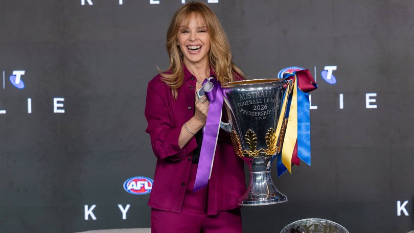 Kylie Minogue with the premiership cup.