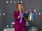 Kylie Minogue with the premiership cup. 
