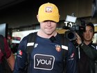 Lachie Neale of the Lions arrives at Melbourne Airport.
