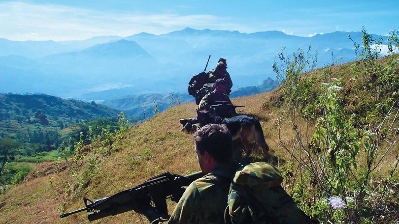 Soldiers from 2 Commando Regiment operating in the mountains of East Timor in 2001. Sergeant Ian Turner joined the unit in 2003 and died in 2017.