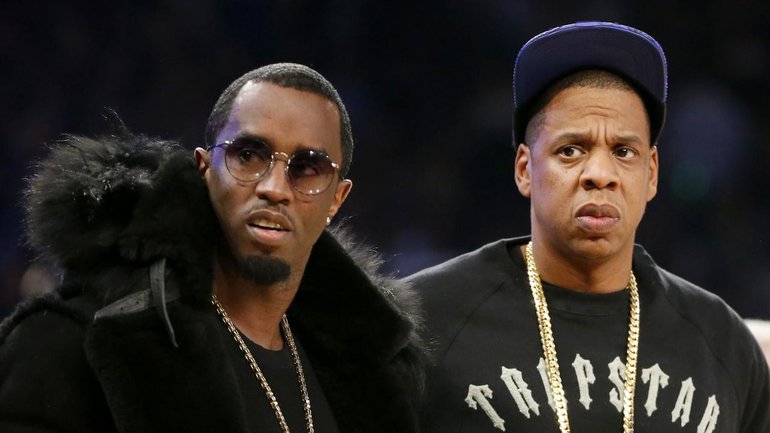 A woman now says neither Sean "Diddy" Combs nor Jay-Z raped her in 2000 when she was 13. (AP PHOTO)