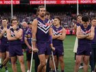 Dockers players look on after their defeat.