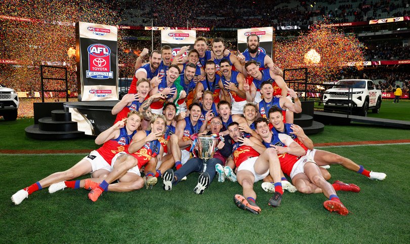 Brisbane players celebrate.