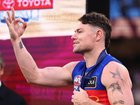 Lachie Neale of the Lions celebrates after the AFL Grand Final.