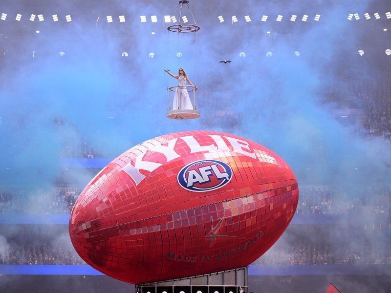 Kylie Minogue delighted AFL fans at the MCG with a hit-loaded grand final day performance. 