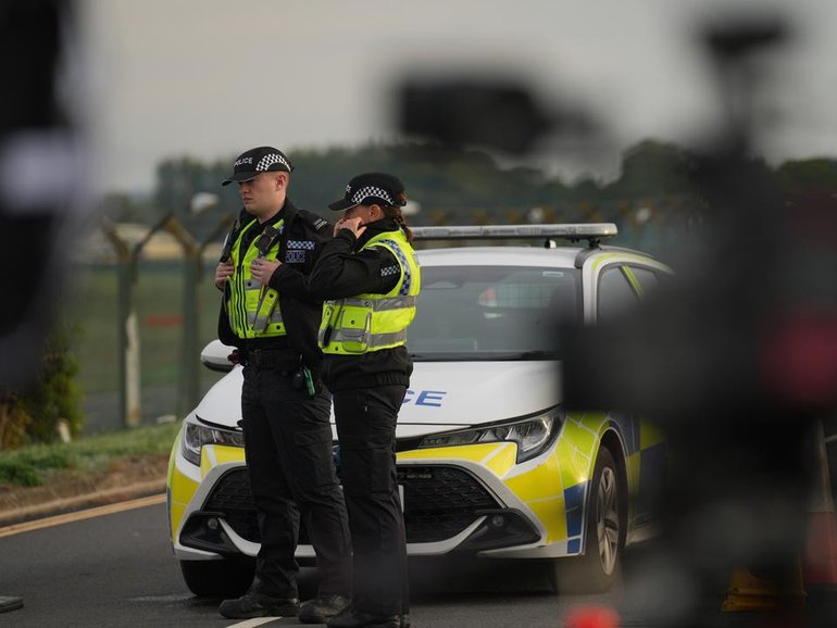 A major terrorism investigation is under way after five men in vans were stopped near RAF Fairford. (AP PHOTO)