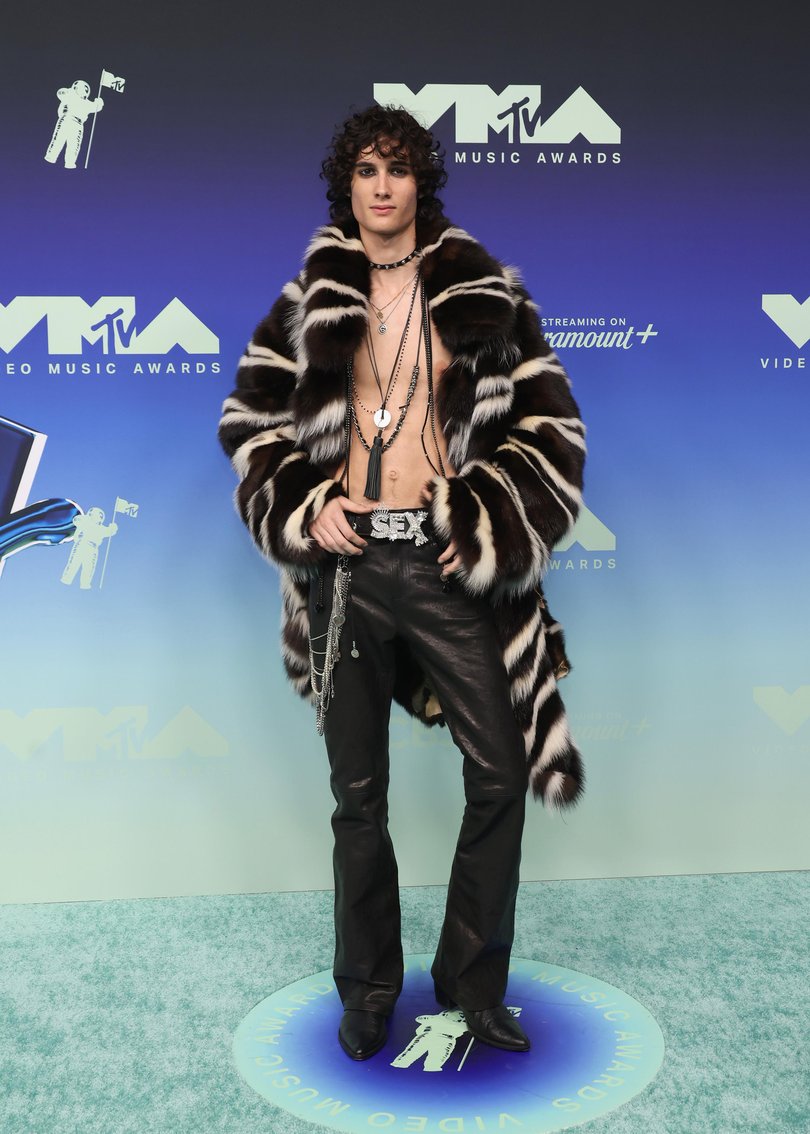 Singer-songwriter Sombr flashed his chest in an oversized striped fur coat, coupled with a pair of leather pants and ‘sex’ belt.