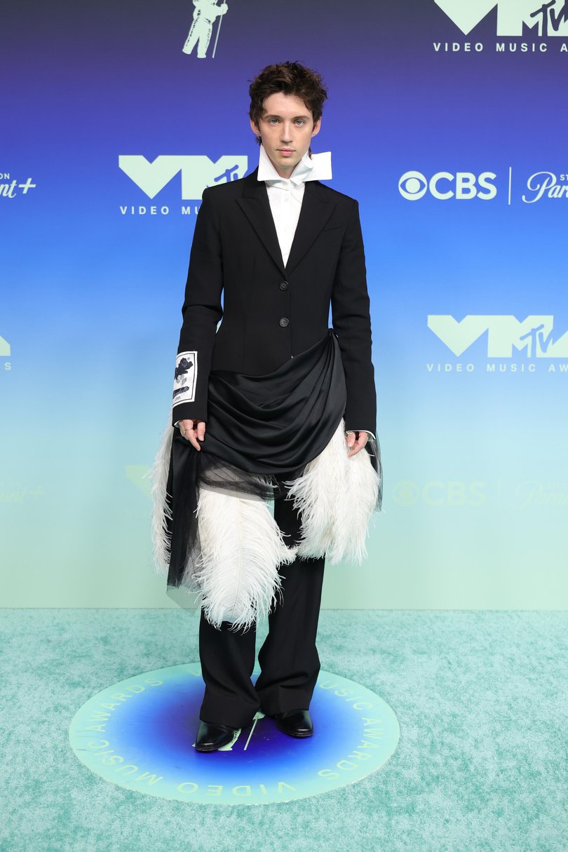 WA raised Troye Sivan opted for a feathery display for the red carpet.