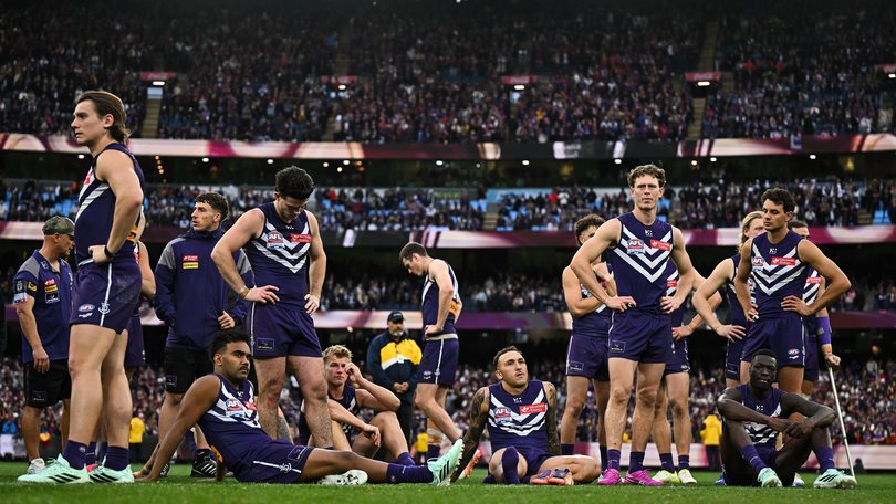 MELBOURNE, AUSTRALIA - SEPTEMBER 26: The Dockers reflect after the loss during the AFL Grand Final match between the Fremantle Dockers and the Brisbane Lions at the Melbourne Cricket Ground on September 26, 2026 in Melbourne, Australia. (Photo by Daniel Carson/AFL Photos) Daniel Carson